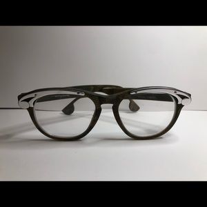 LA Eyeworks Frame Snakeskin Tortoise color with silver accent pieces $100.